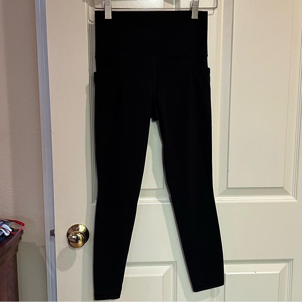 Athleta Salutation Stash High Rise 7/8 leggings